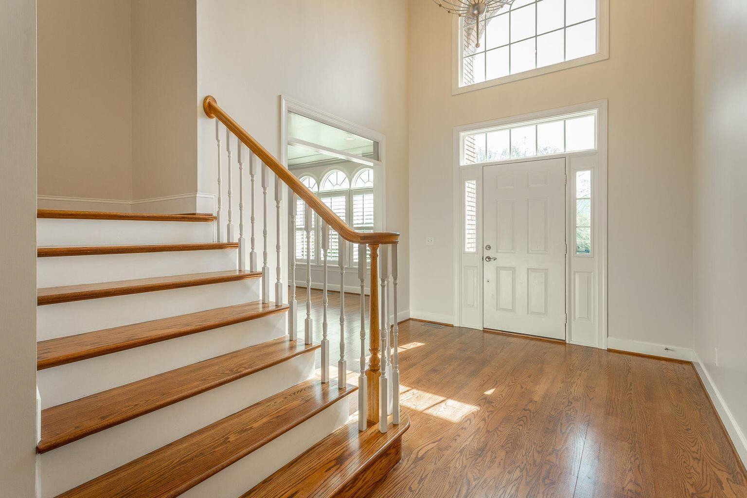 9619 Windrose Circle Chattanooga, TN 37421 - Photo 3 of 69 a view of entryway with wooden floor and stairs