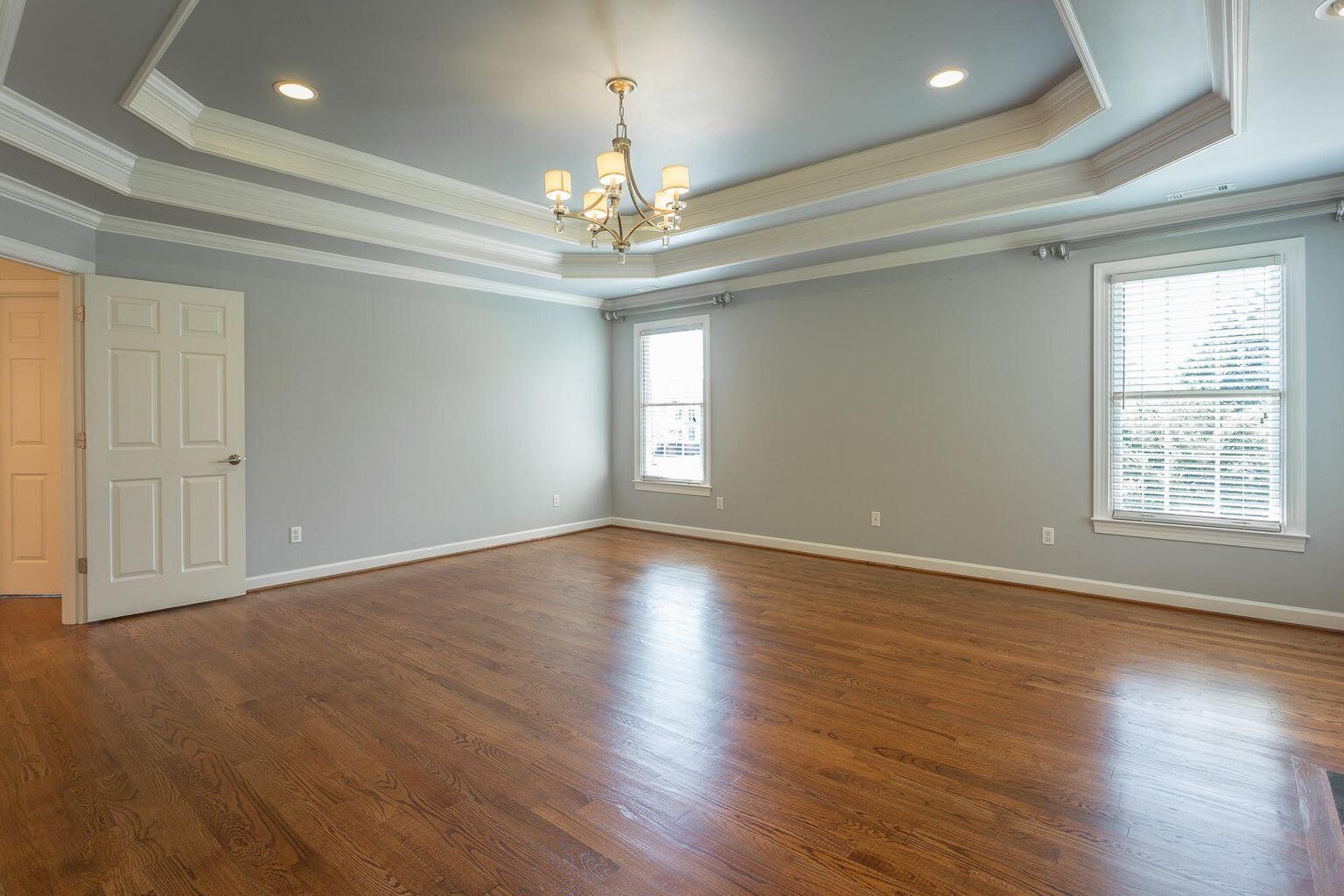 9619 Windrose Circle Chattanooga, TN 37421 - Photo 34 of 69 a view of an empty room with wooden floor and a window