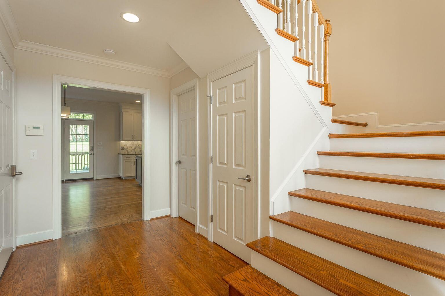 9619 Windrose Circle Chattanooga, TN 37421 - Photo 5 of 69 a view of a hallway with wooden floor and entryway