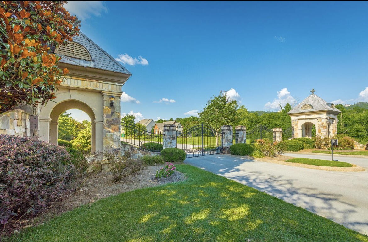 9619 Windrose Circle Chattanooga, TN 37421 - Photo 64 of 69 a view of a house with a yard