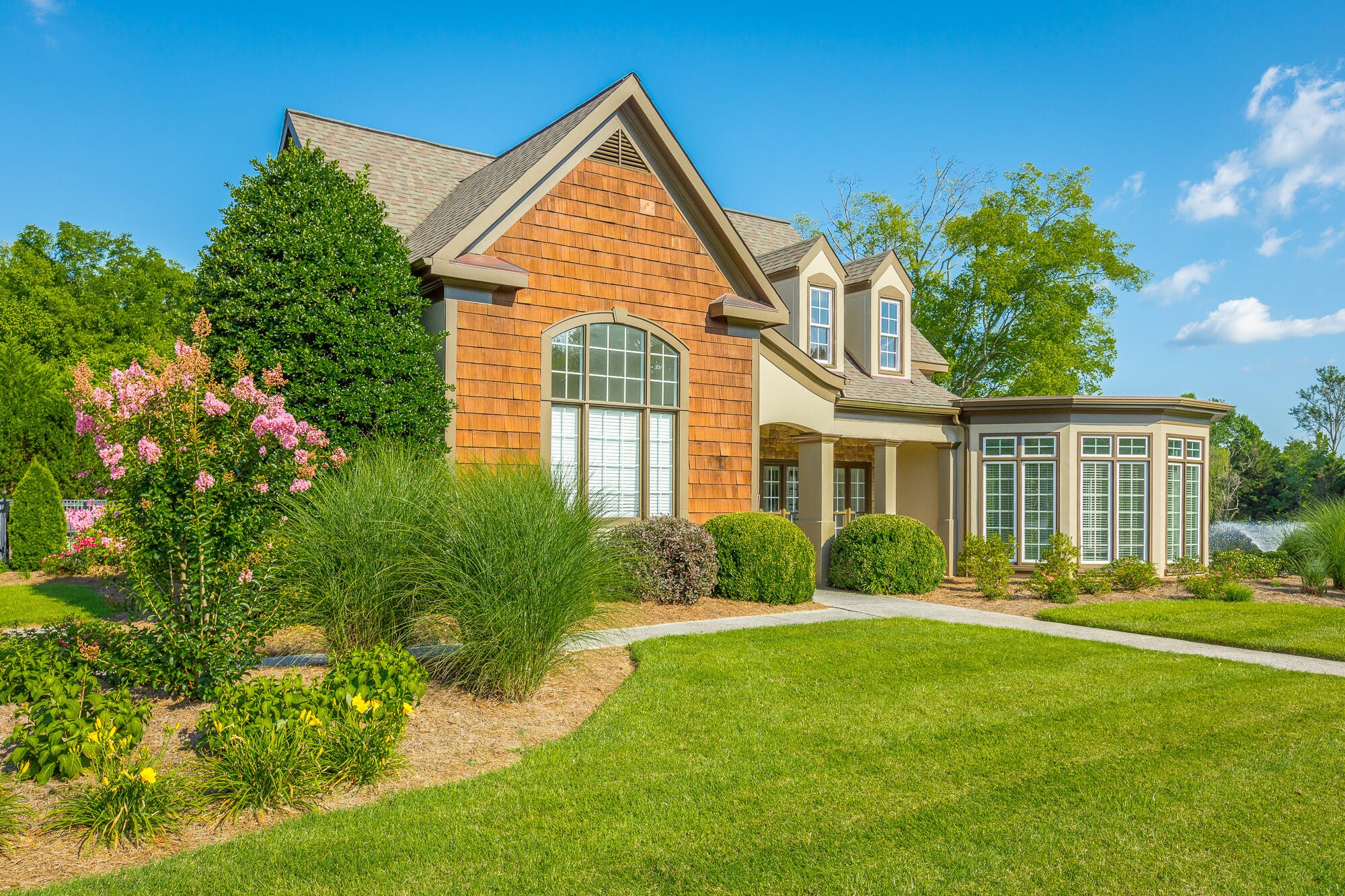 9619 Windrose Circle Chattanooga, TN 37421 - Photo 67 of 69 a front view of a house with a yard