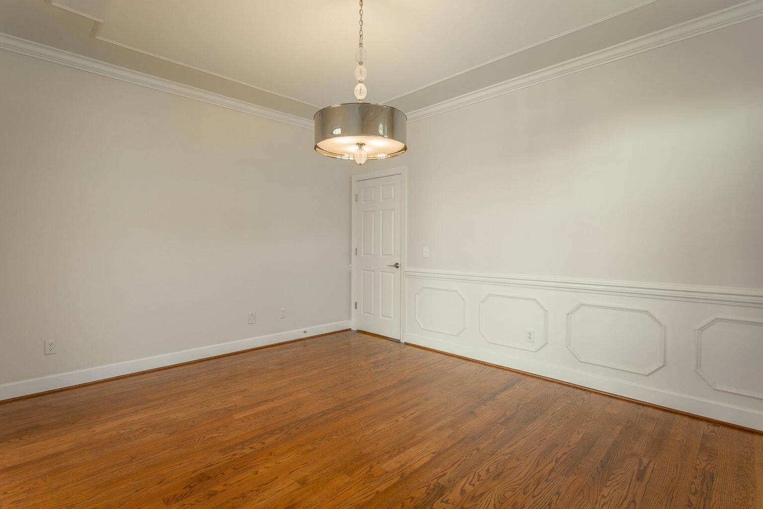 9619 Windrose Circle Chattanooga, TN 37421 - Photo 10 of 69 a view of an empty room with wooden floor and a window
