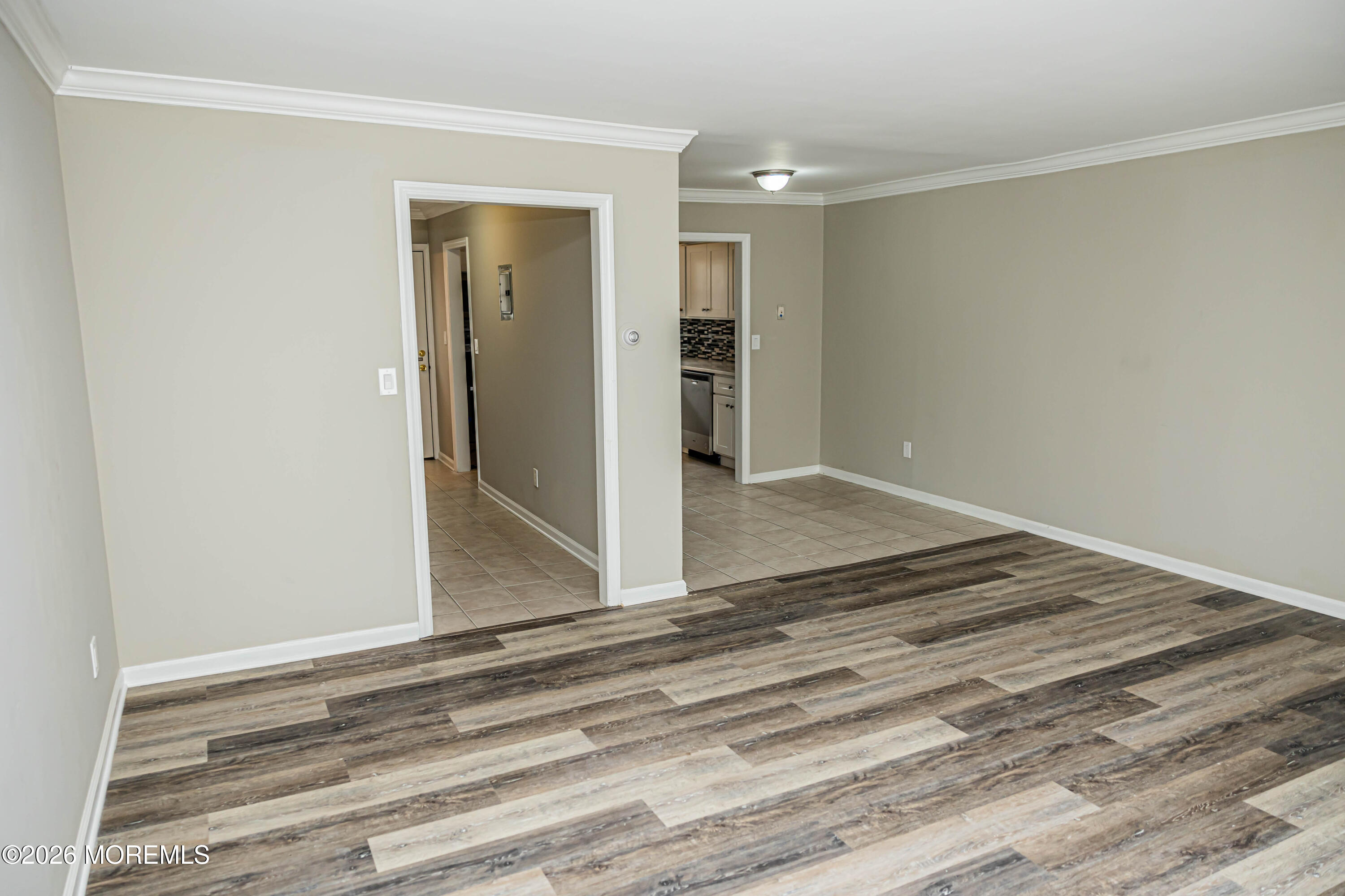 18 Windsor Terrace, Unit 18 Freehold, NJ 07728 - Photo 13 of 37 a view of a room with wooden floor