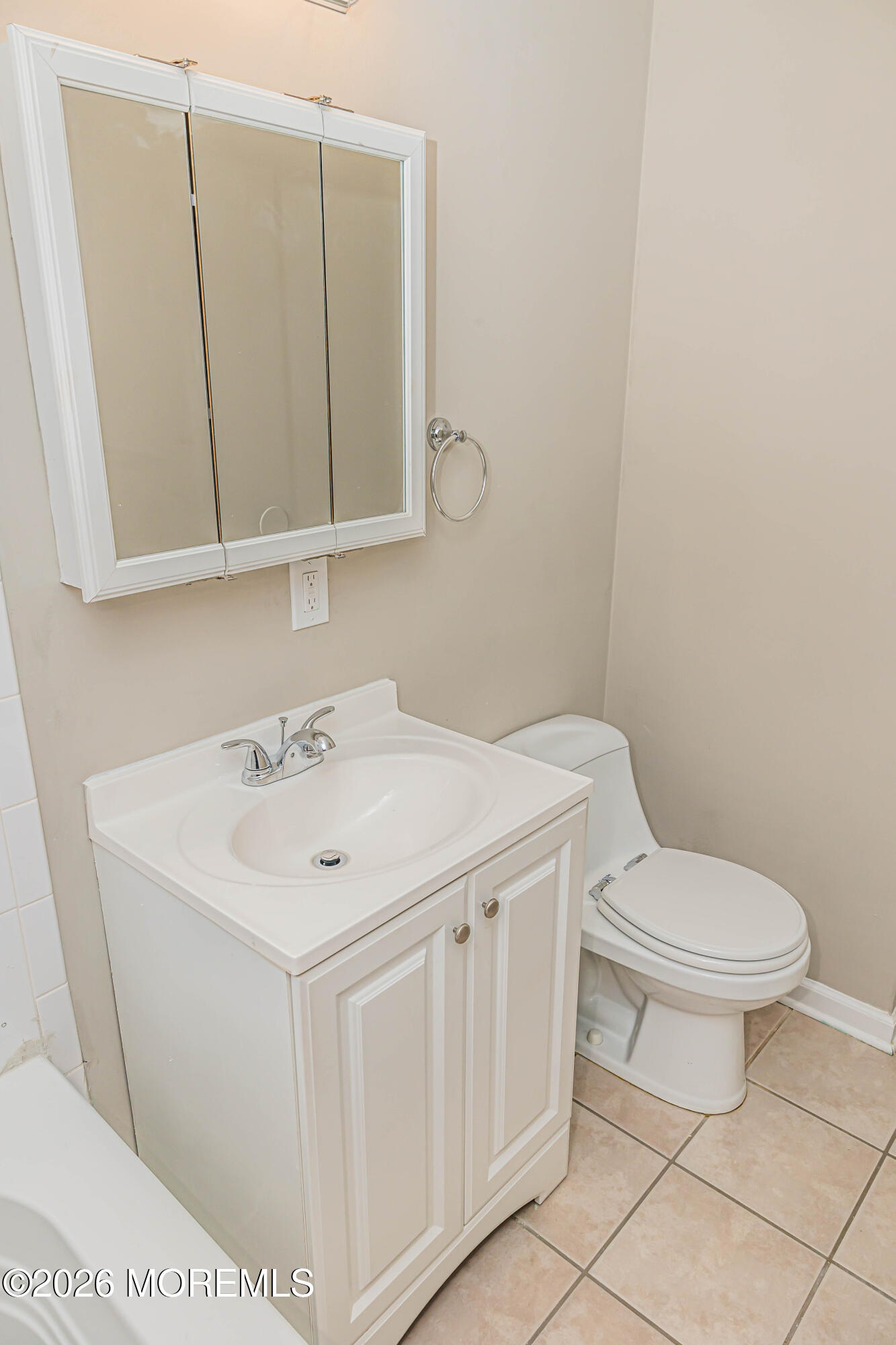 18 Windsor Terrace, Unit 18 Freehold, NJ 07728 - Photo 25 of 37 a bathroom with a sink toilet and mirror