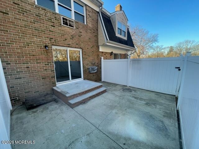 18 Windsor Terrace, Unit 18 Freehold, NJ 07728 - Photo 31 of 37 a view of a large brick building