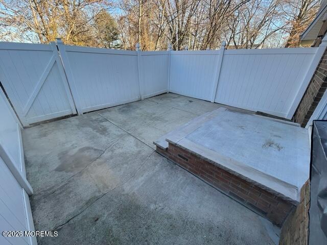 18 Windsor Terrace, Unit 18 Freehold, NJ 07728 - Photo 35 of 37 a view of a backyard