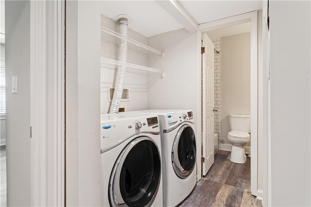 6700 Roswell Road, Unit 23A Atlanta, GA 30328 - Photo 13 of 18 a view of livingroom with washer and dryer