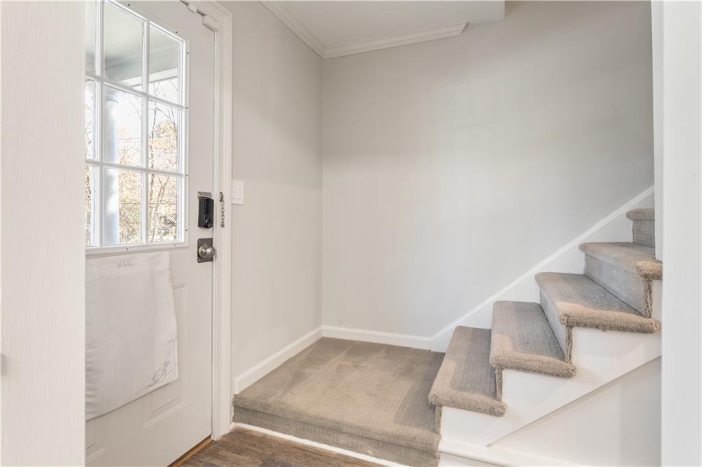 6700 Roswell Road, Unit 23A Atlanta, GA 30328 - Photo 3 of 18 an empty room with windows