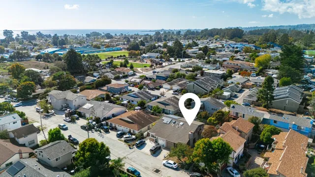 an aerial view of a city with lots of residential buildings