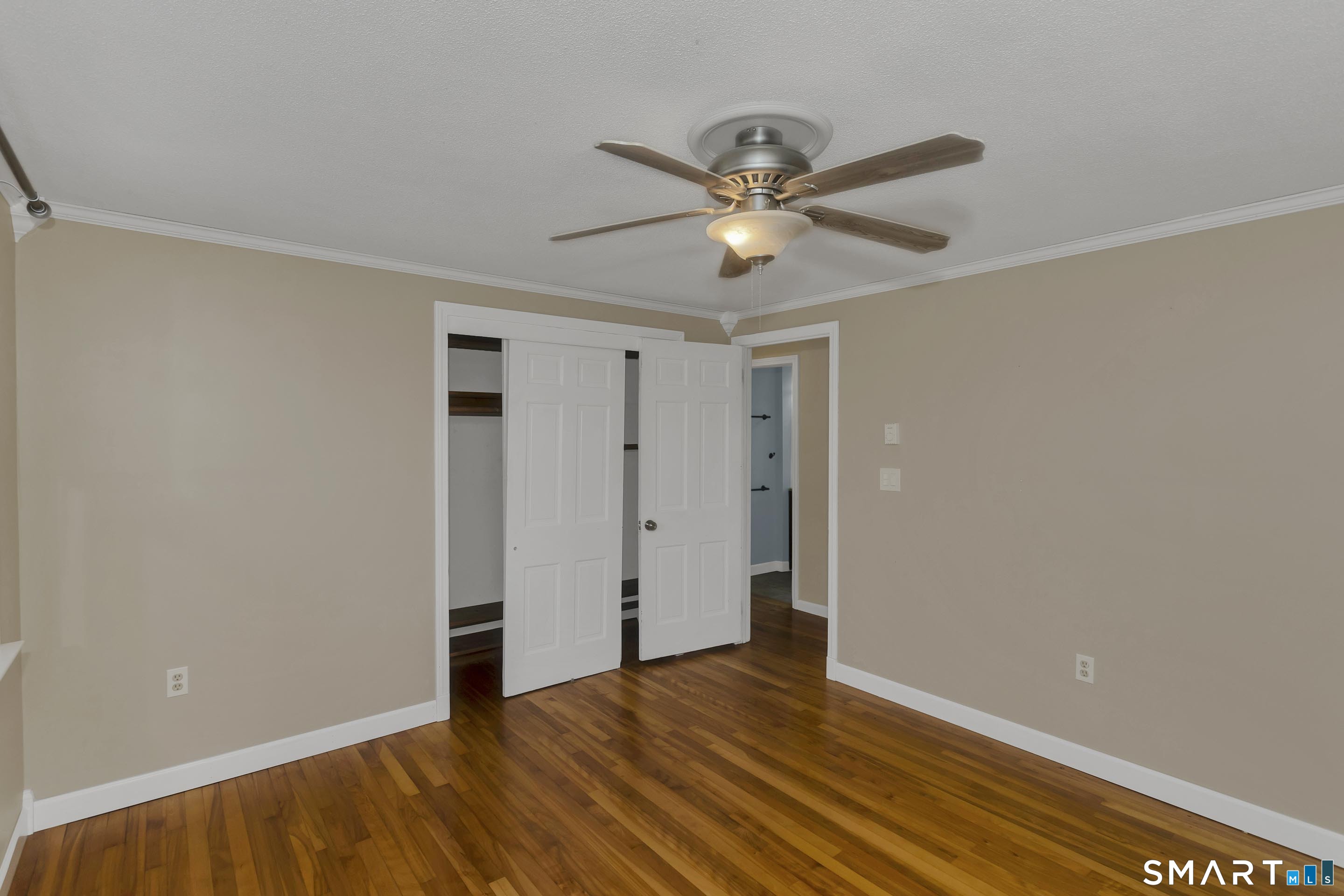 73 Laurel Street Enfield, CT 06082 - Photo 23 of 40 a view of empty room with wooden floor