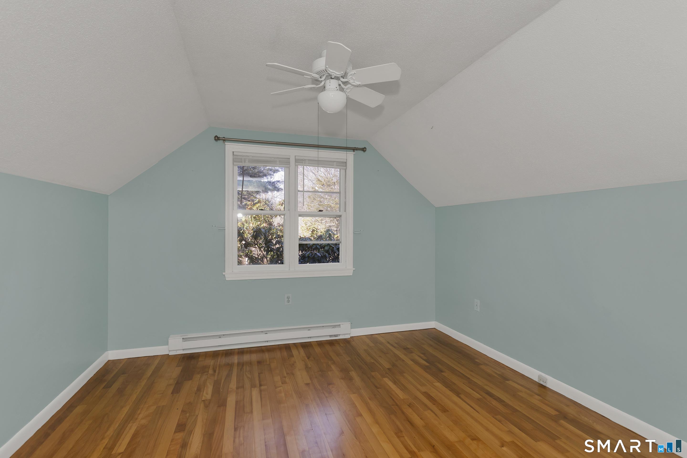 73 Laurel Street Enfield, CT 06082 - Photo 32 of 40 wooden floor in an empty room with a window