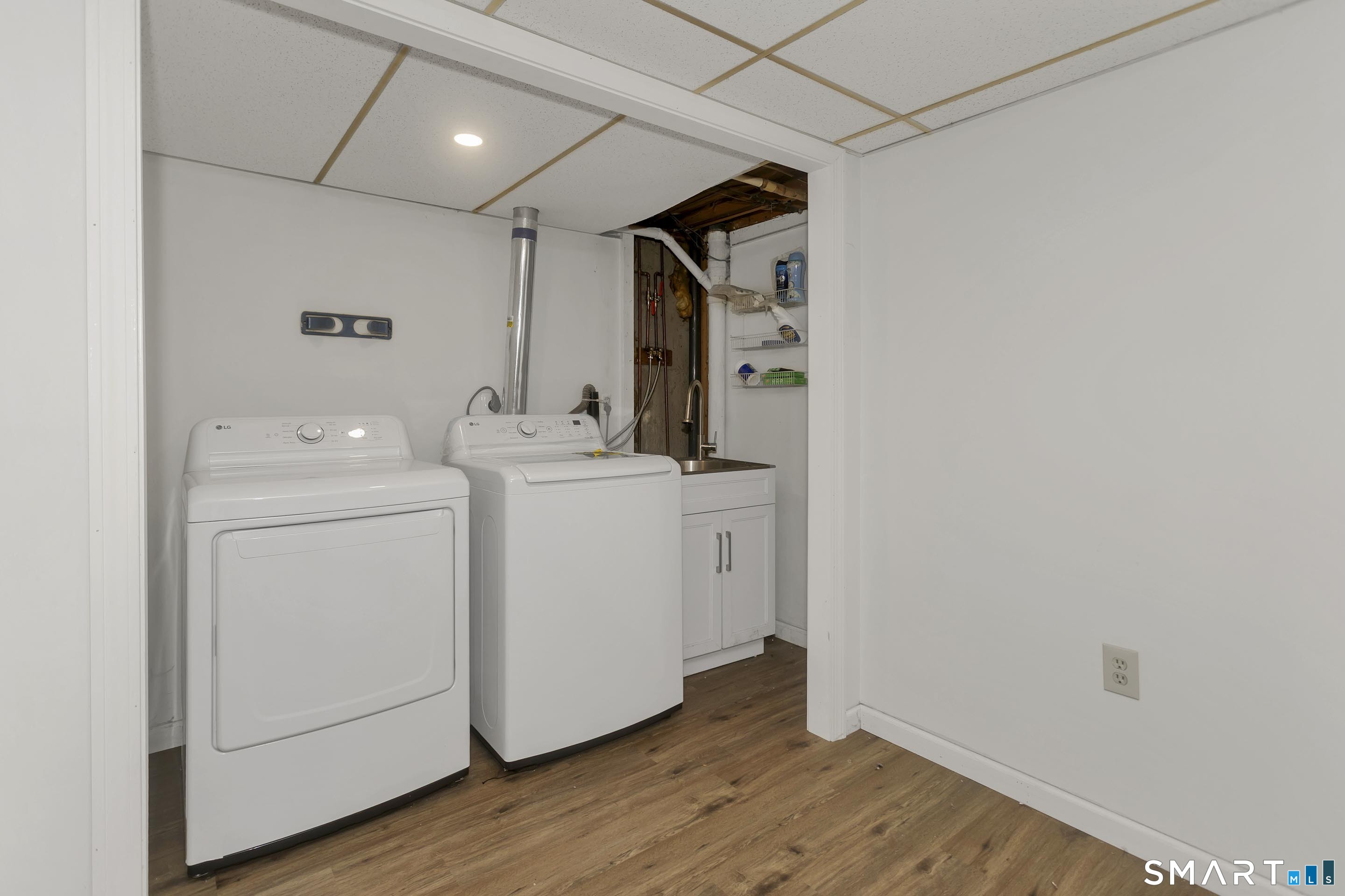 73 Laurel Street Enfield, CT 06082 - Photo 35 of 40 a utility room with dryer and washer