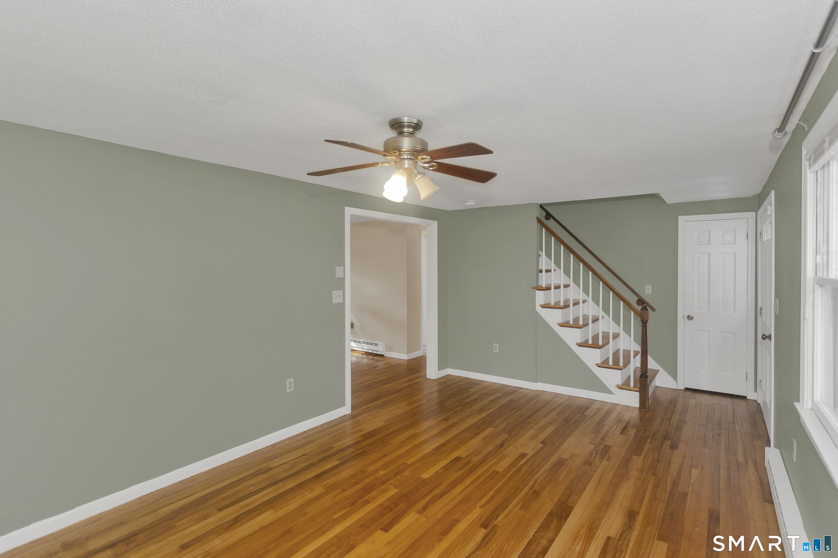 73 Laurel Street Enfield, CT 06082 - Photo 4 of 40 a view of an entryway with wooden floor