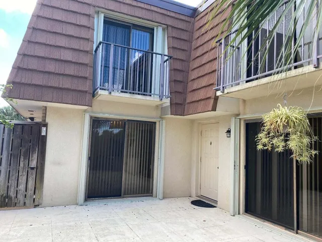 a view of entryway with a wooden door