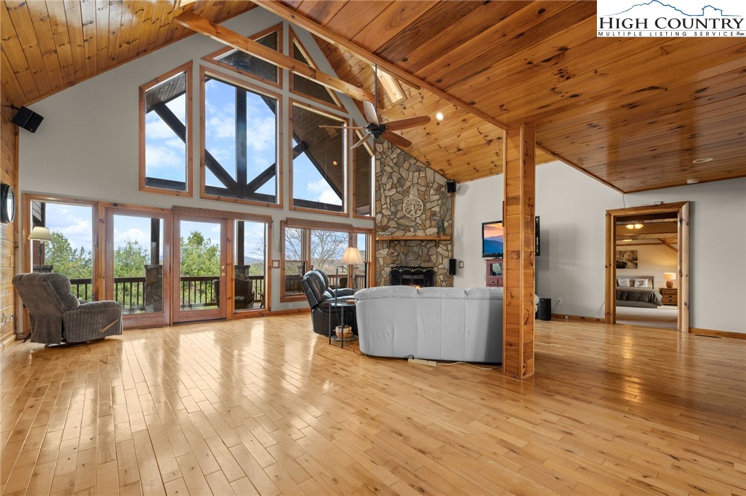 460 Deer Crossing Road Piney Creek, NC 28663 - Photo 6 of 29 a view of livingroom with furniture and floor to ceiling window