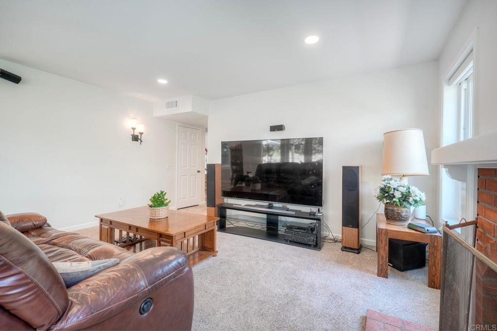 13639 Freeport Road San Diego, CA 92129 - Photo 11 of 44 a living room with furniture and a flat screen tv