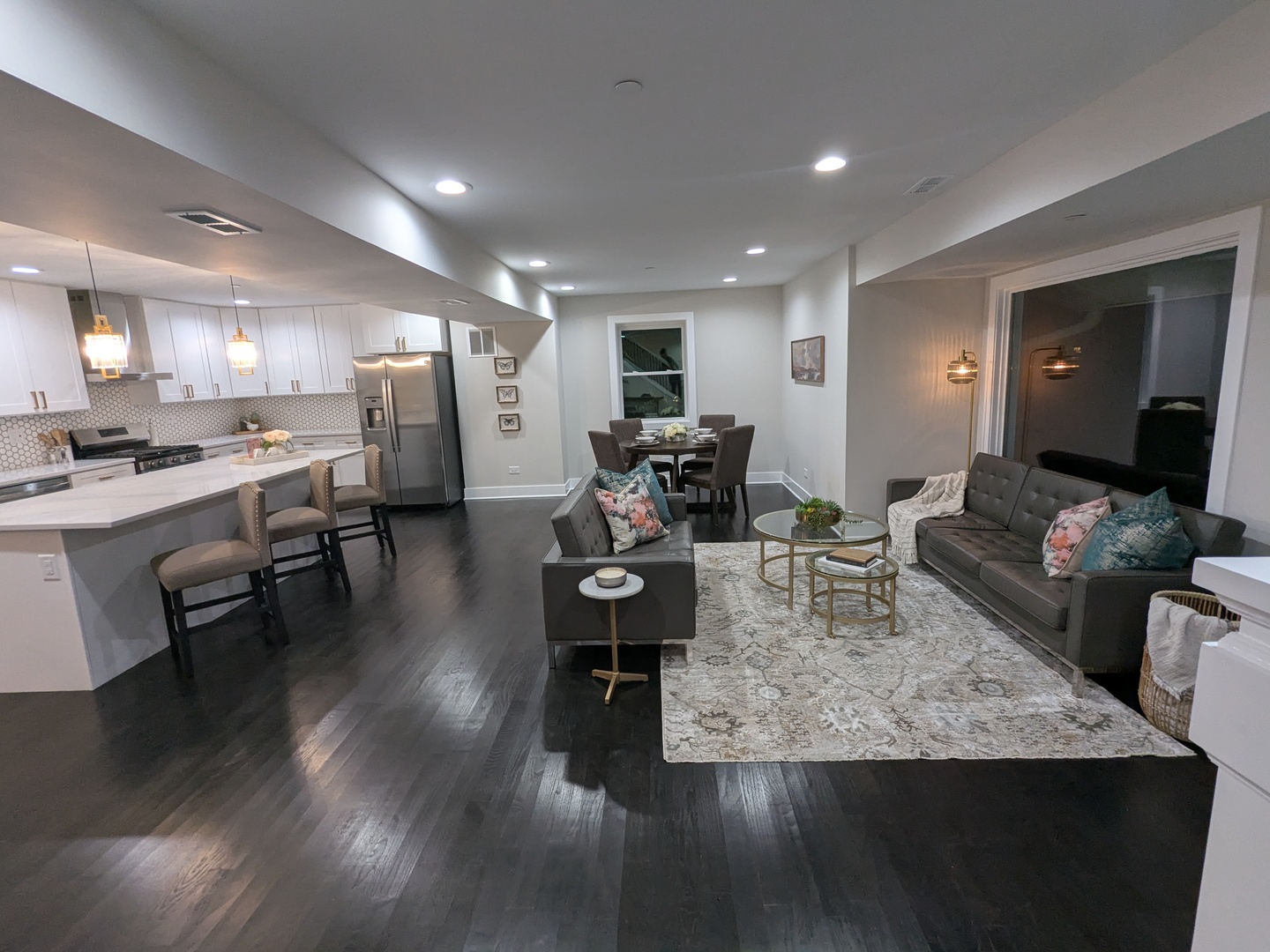 8600 East Prairie Road Skokie, IL 60076 - Photo 14 of 37 a view of a dining room with furniture and wooden floor
