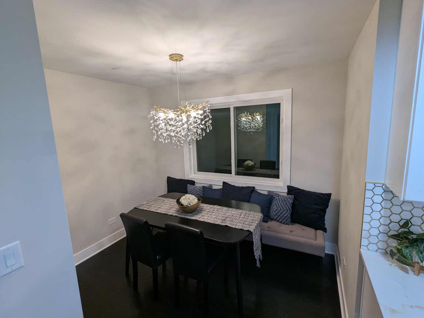 8600 East Prairie Road Skokie, IL 60076 - Photo 17 of 37 a living room with furniture and a chandelier