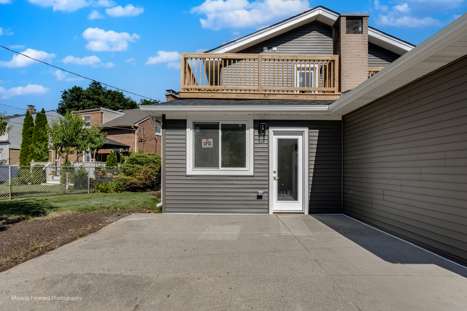 8600 East Prairie Road Skokie, IL 60076 - Photo 5 of 37 a front view of a house with a yard