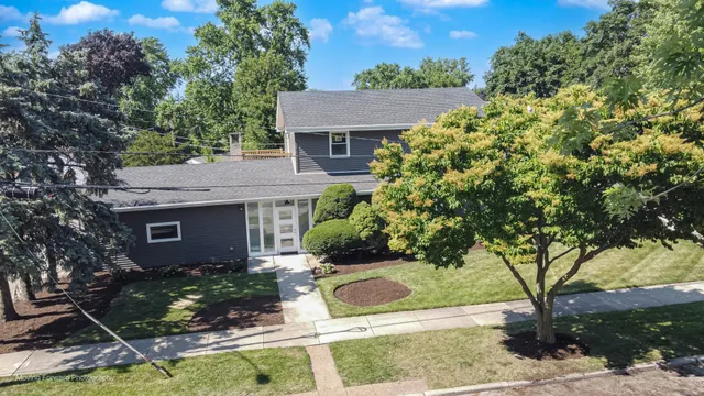 front view of house with a yard