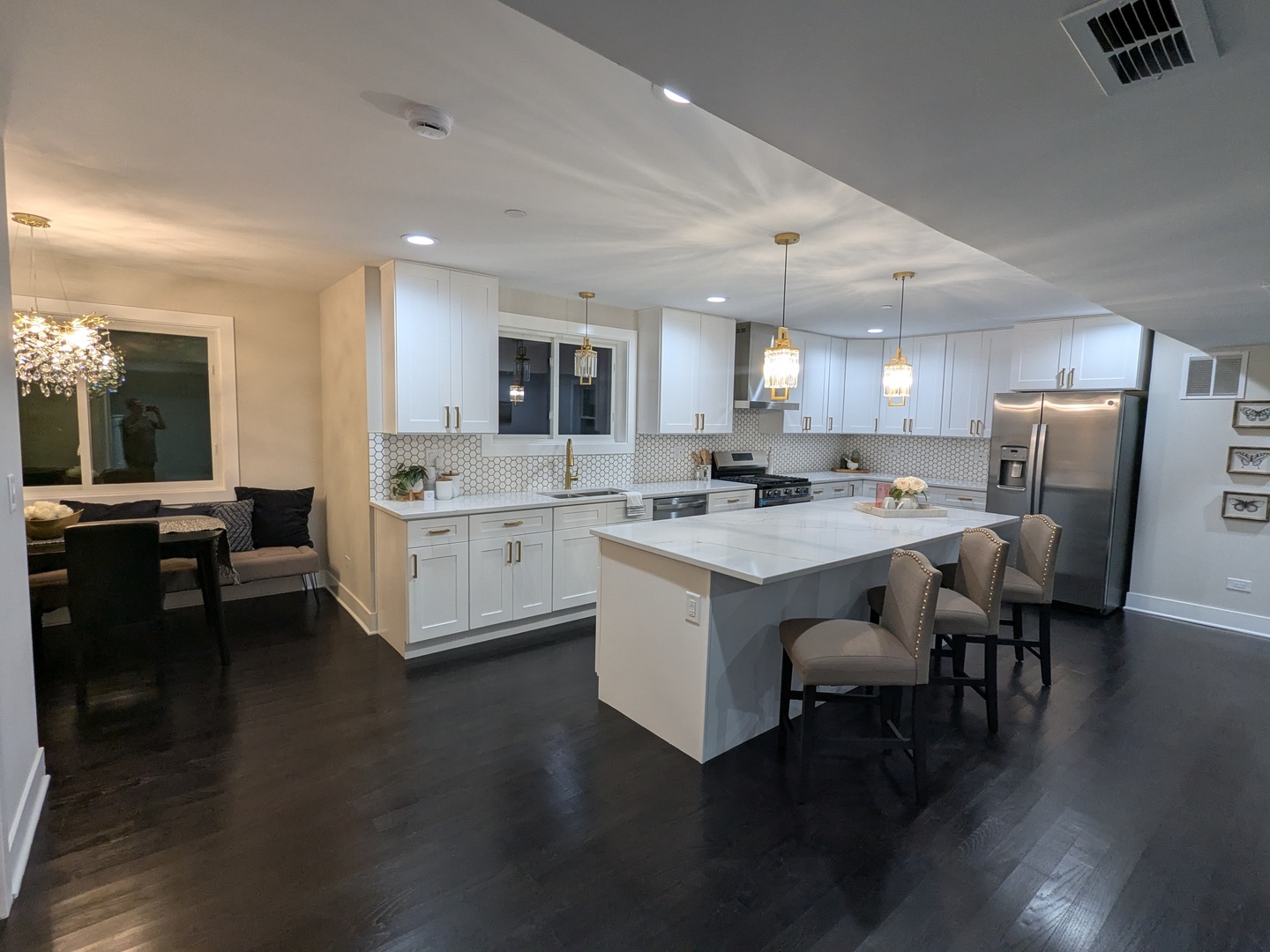 8600 East Prairie Road Skokie, IL 60076 - Photo 10 of 37 a kitchen with a sink cabinets and wooden floor