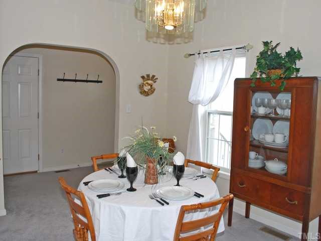 2821 Alder Ridge Lane Raleigh, NC 27603 - Photo 2 of 12 Formal Dining Room w/ Arched Doorway