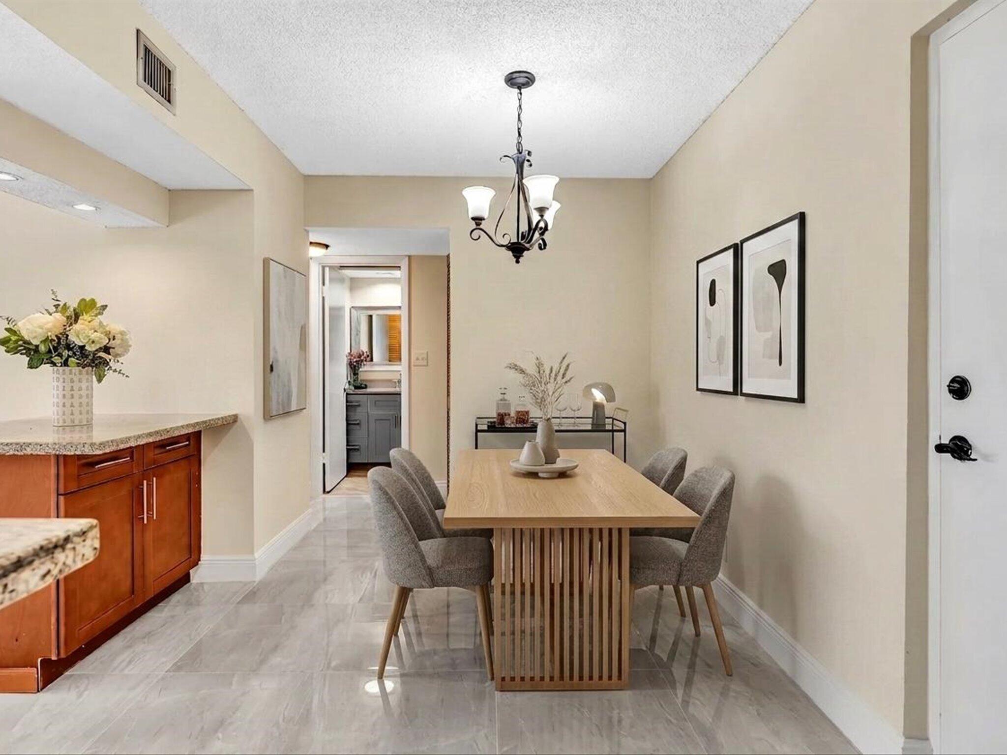 470 Northwest 20th Street, Unit 3020 Boca Raton, FL 33431 - Photo 6 of 43 Virtually Staged Dining