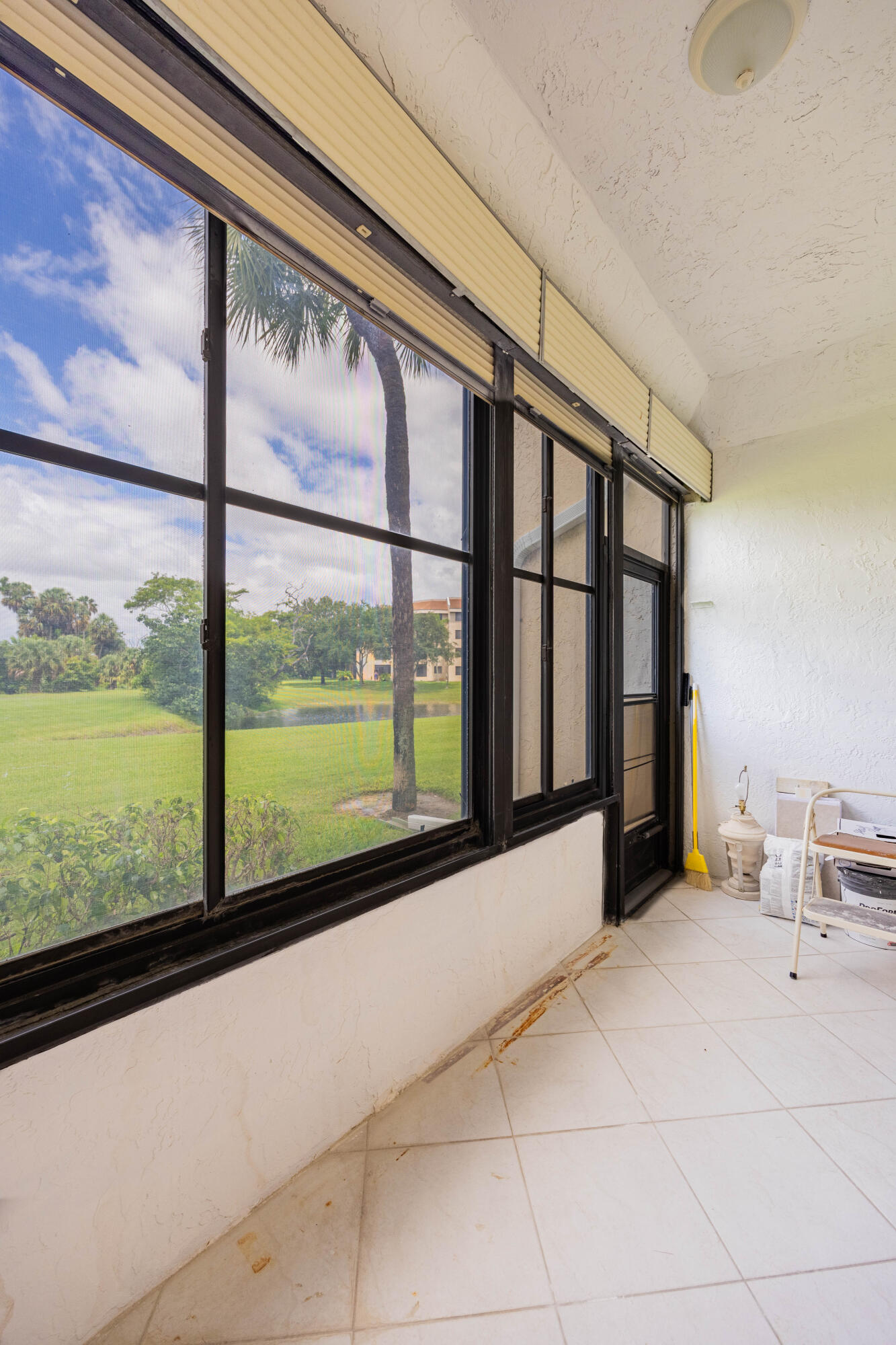 7520 La Paz Boulevard, Unit 104 Boca Raton, FL 33433 - Photo 40 of 56 a view of an ocean with a floor to ceiling window and an outdoor view