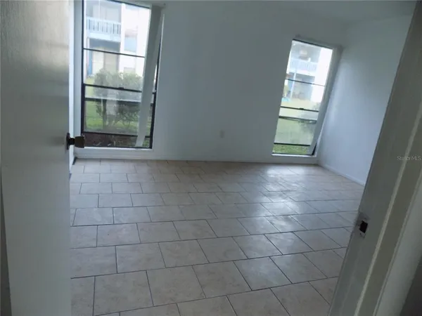 an empty room with sliding door