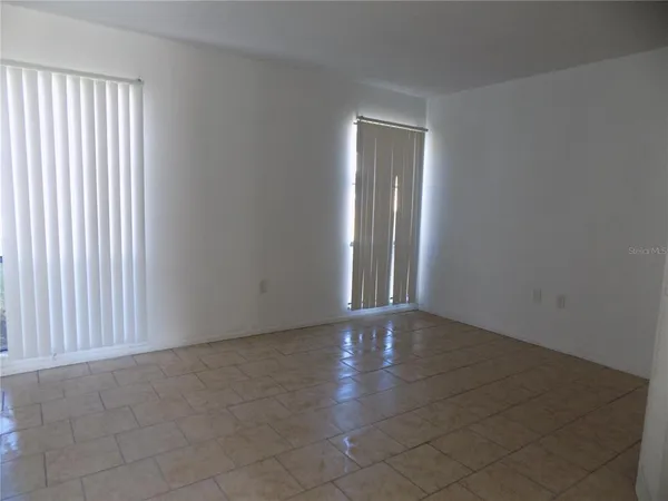 an empty room with an entryway