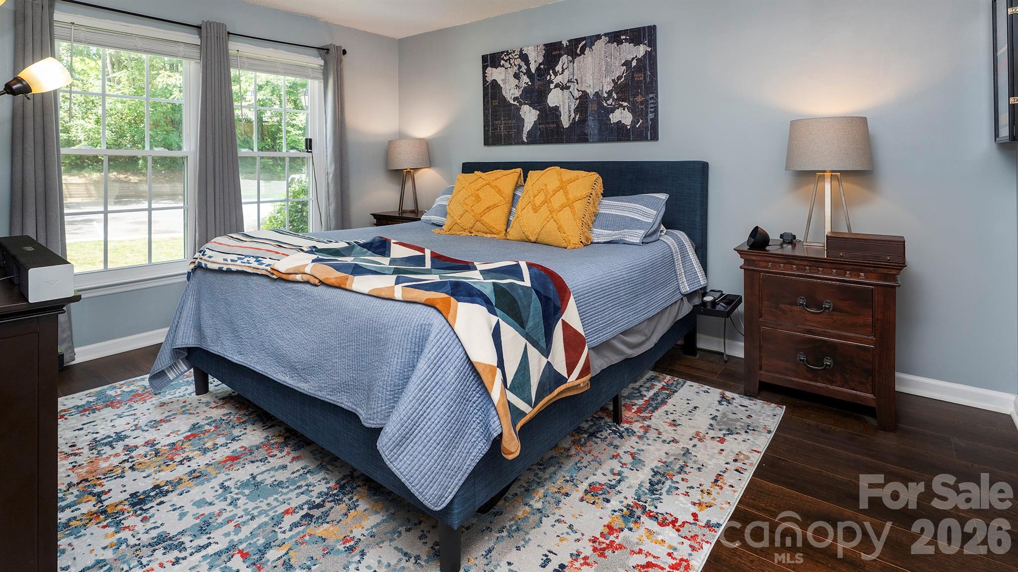 19823 Henderson Road, Unit C Cornelius, NC 28031 - Photo 12 of 23 a bedroom with furniture and a rug