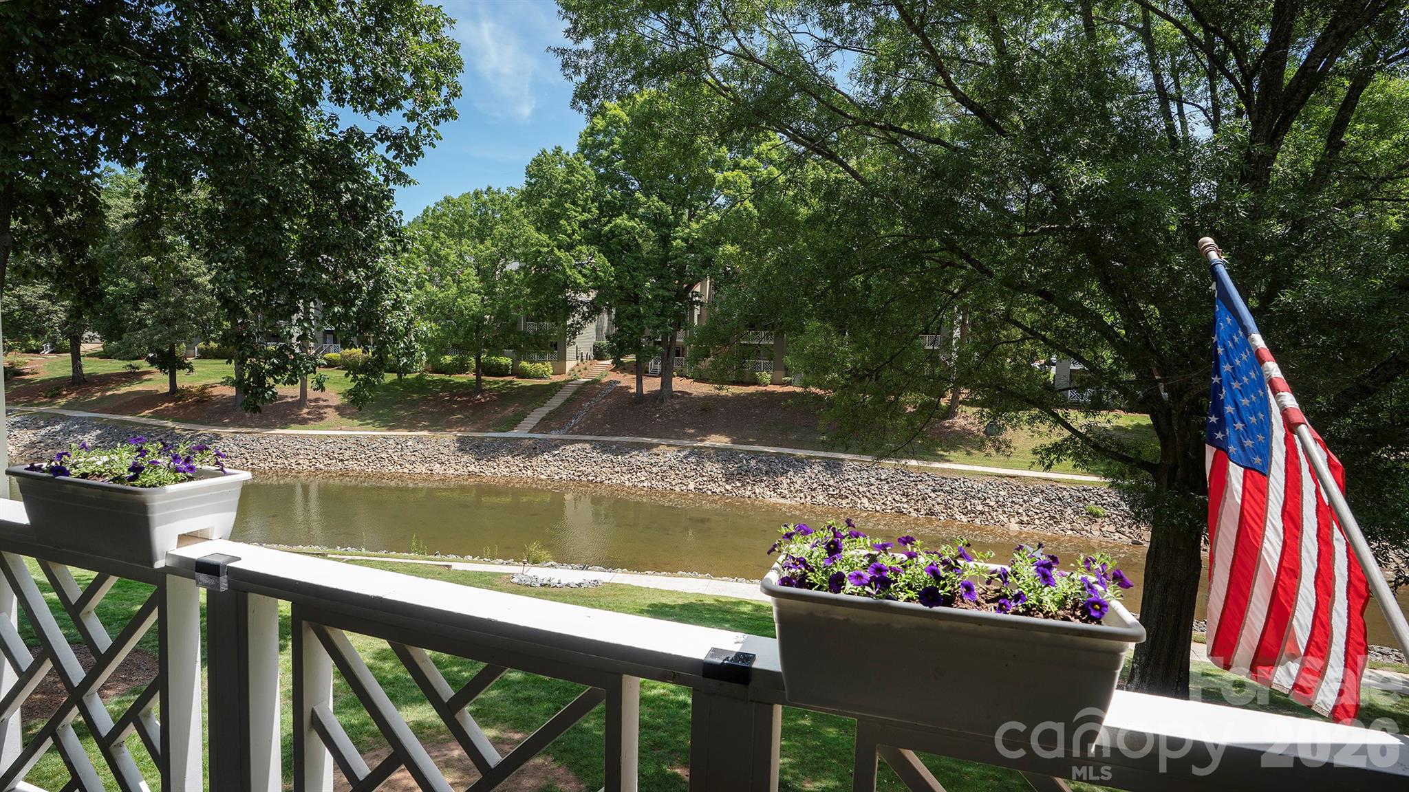 19823 Henderson Road, Unit C Cornelius, NC 28031 - Photo 17 of 23 a view of a house with a tub and a swimming pool