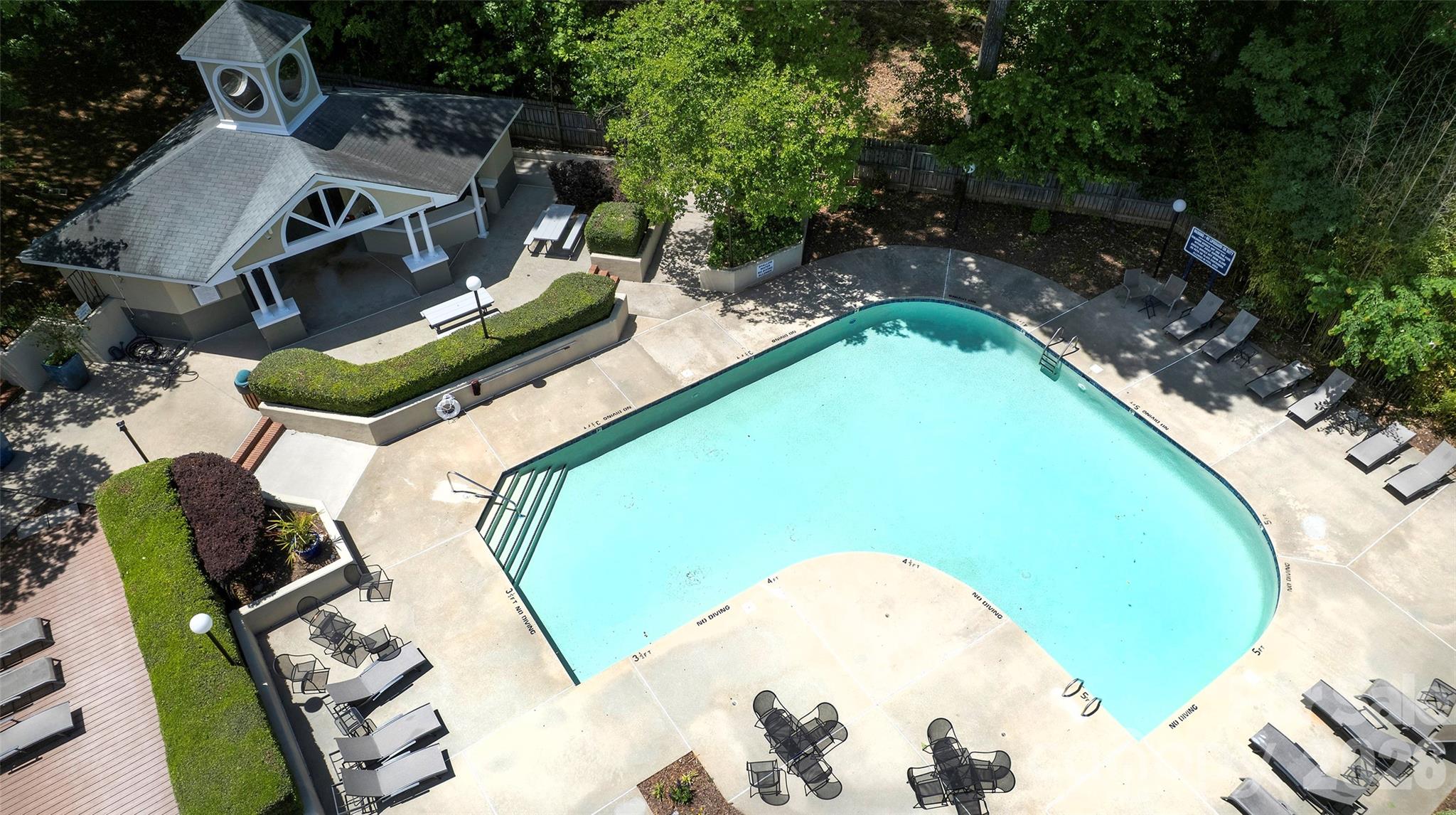 19823 Henderson Road, Unit C Cornelius, NC 28031 - Photo 22 of 23 an aerial view of a swimming pool with outdoor seating