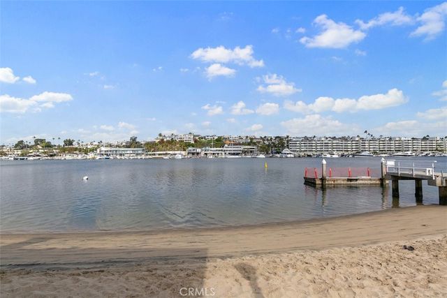 a view of a garden with a house