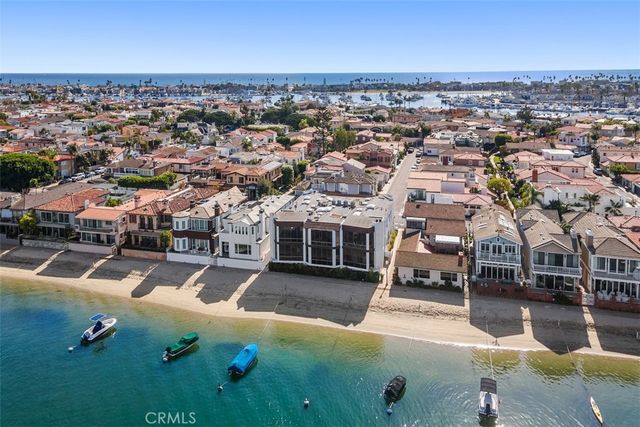 an aerial view of a house with swimming pool