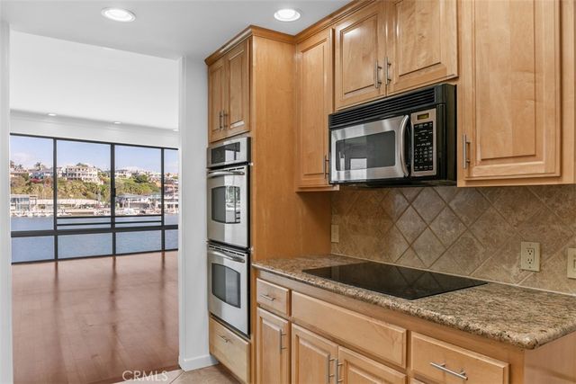 a large bathroom with a double vanity sink mirror and shower