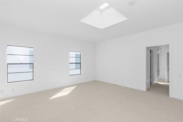 a view of a door and a window