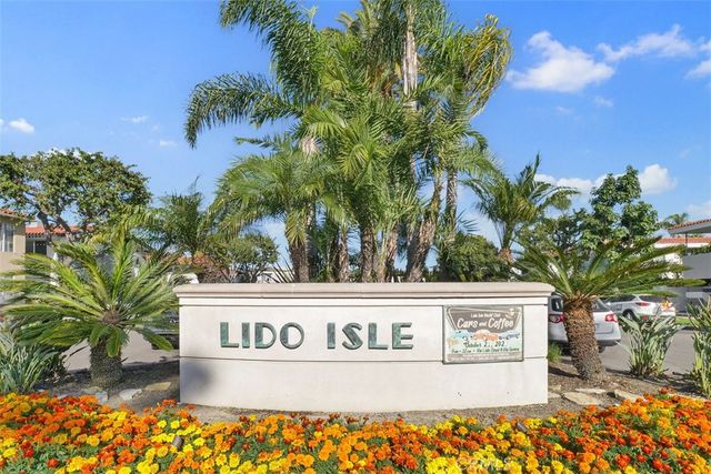 a view of a balcony with yard