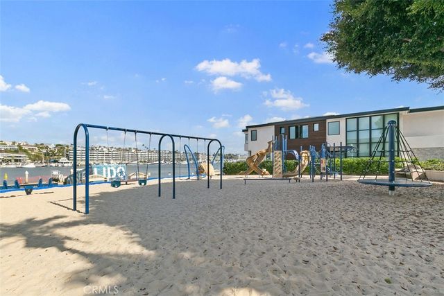 a view of a swimming pool with a lounge chair
