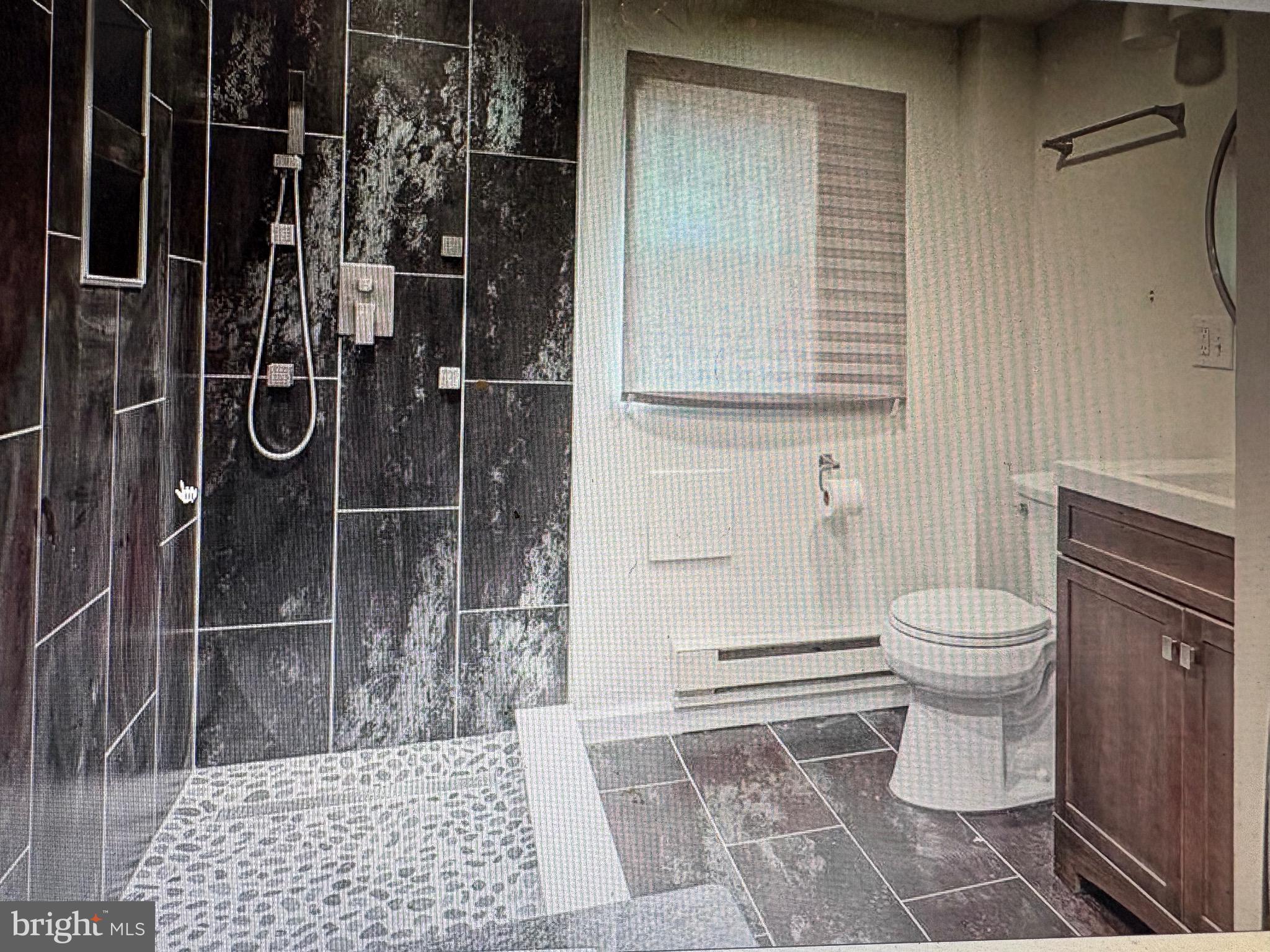 1929 North 9th Street Philadelphia, PA 19122 - Photo 11 of 21 a bathroom with a toilet and a shower