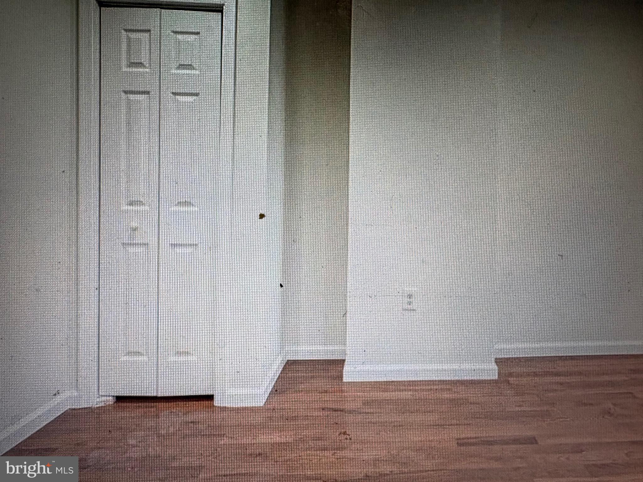 1929 North 9th Street Philadelphia, PA 19122 - Photo 13 of 21 a view of an empty room with wooden floor