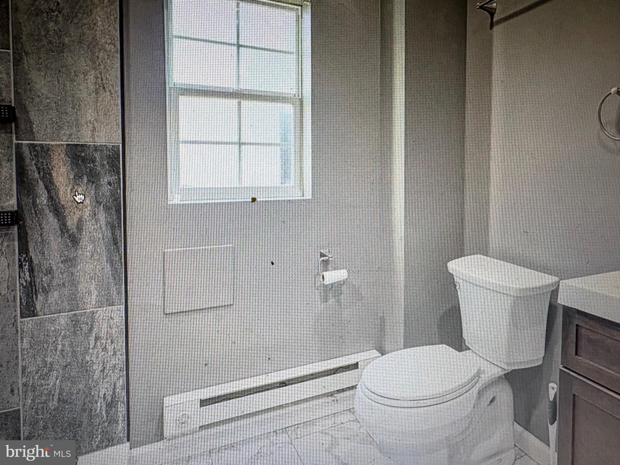 1929 North 9th Street Philadelphia, PA 19122 - Photo 7 of 21 a bathroom with a toilet and a shower