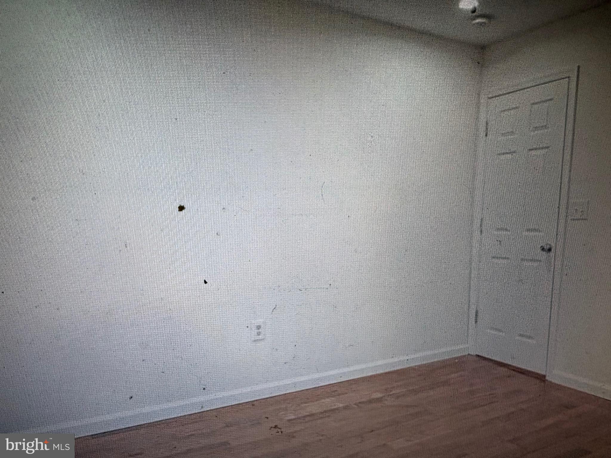 1929 North 9th Street Philadelphia, PA 19122 - Photo 9 of 21 an empty room with wooden floor