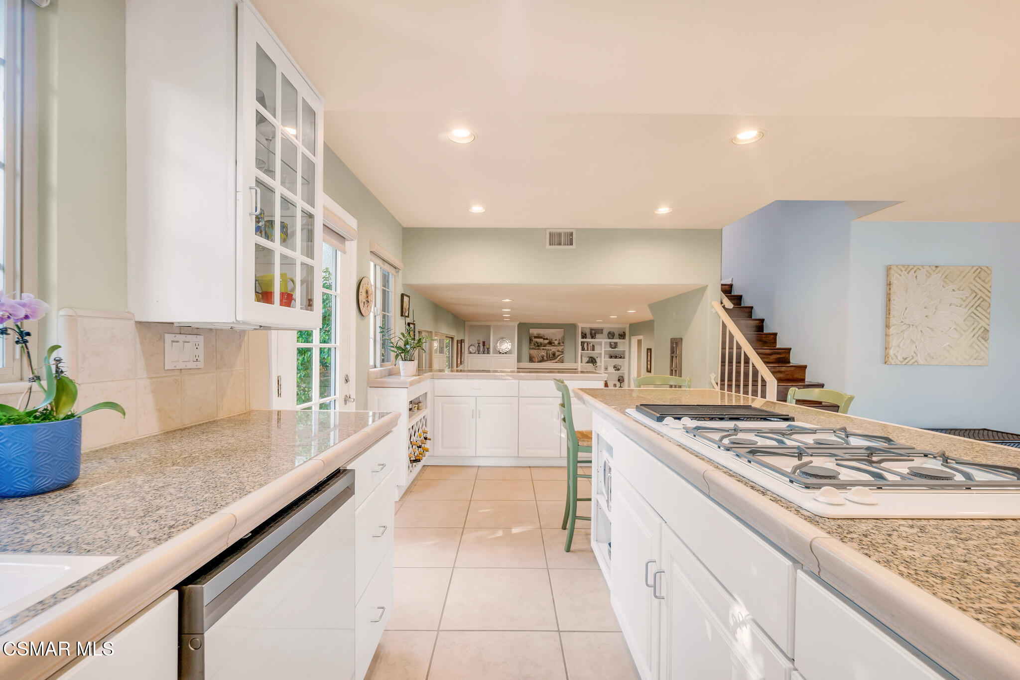 3037 Divernon Avenue Simi Valley, CA 93063 - Photo 14 of 44 a large kitchen with stainless steel appliances granite countertop a lot of counter space and a sink