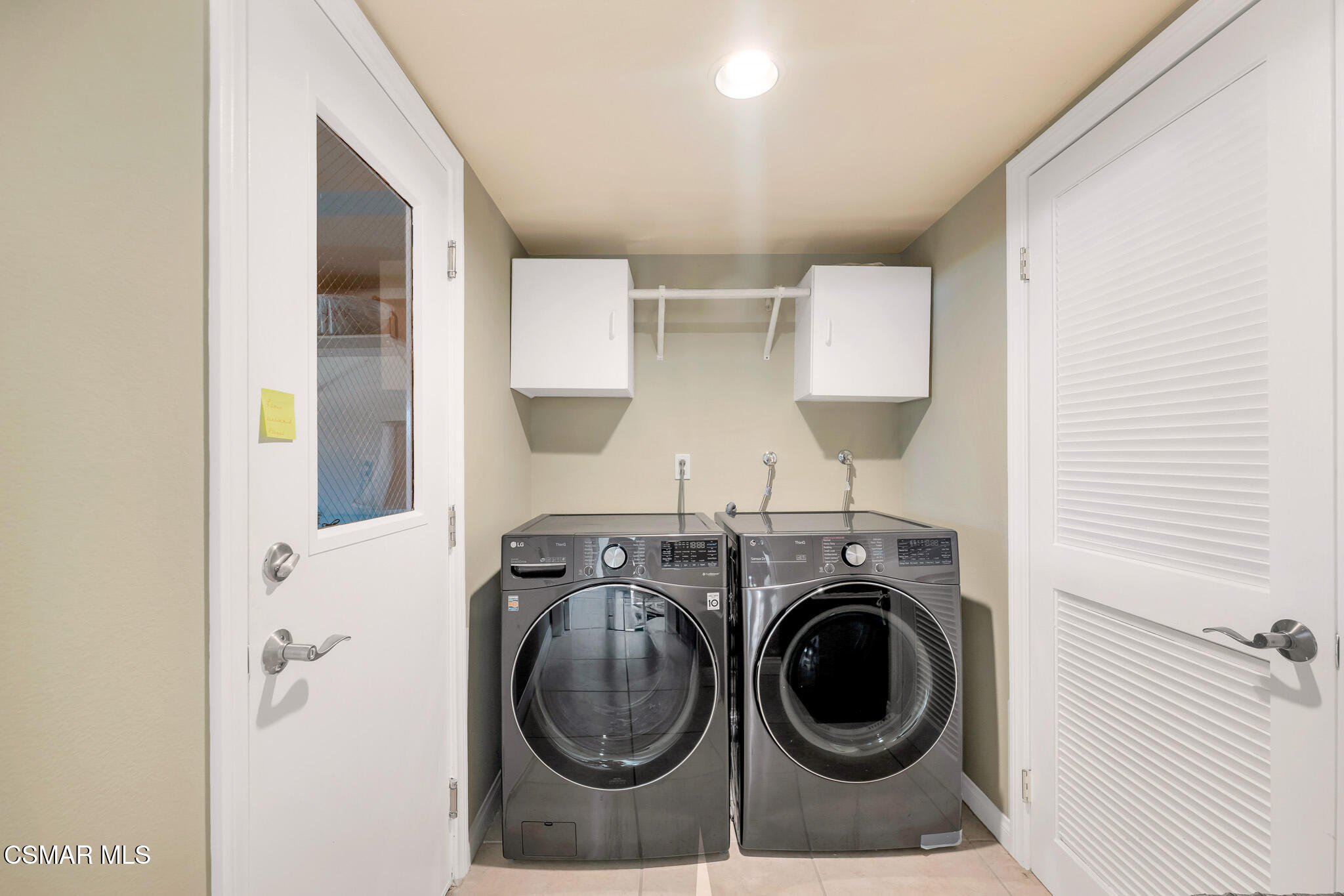 3037 Divernon Avenue Simi Valley, CA 93063 - Photo 16 of 44 a utility room with sink dryer and washer