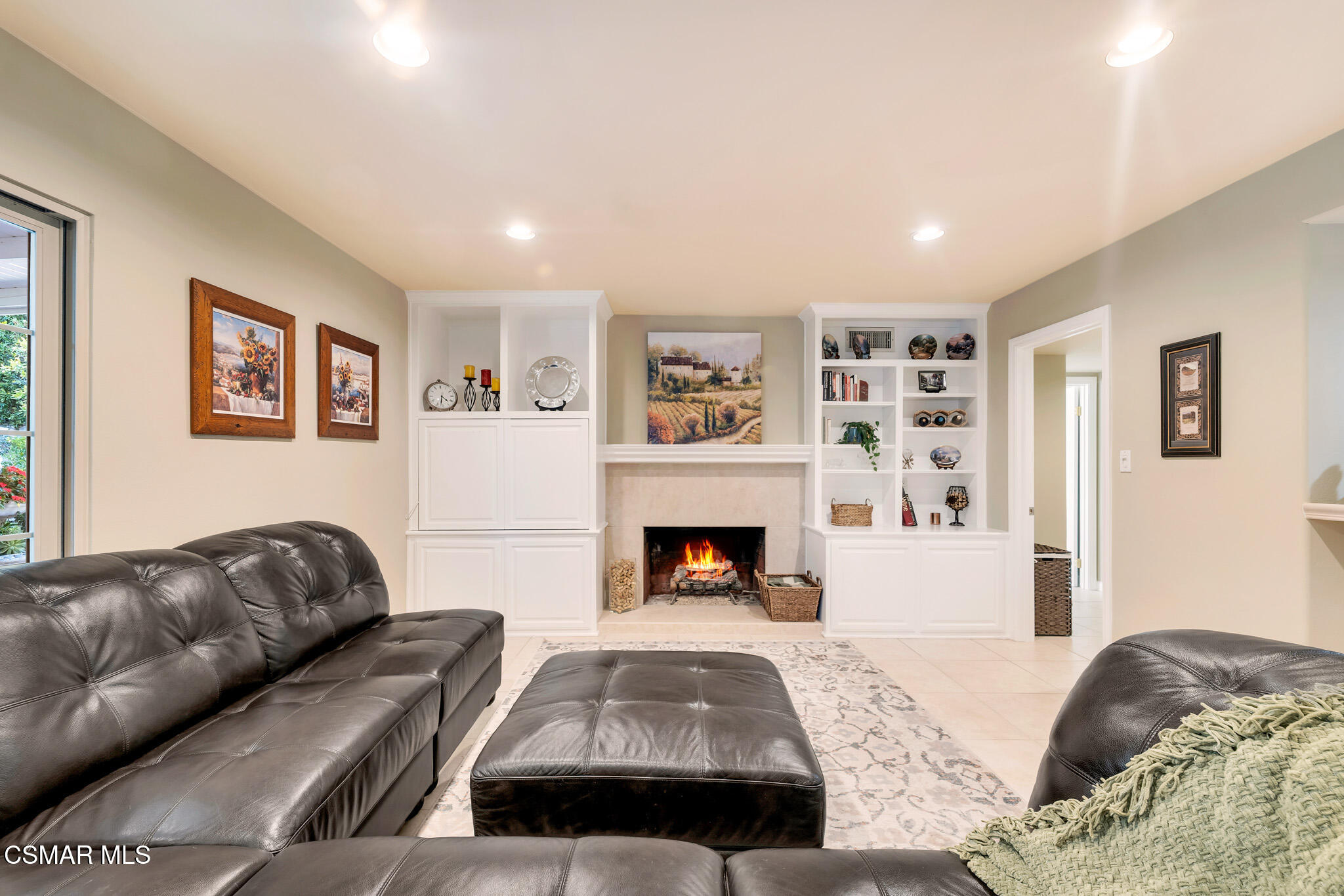 3037 Divernon Avenue Simi Valley, CA 93063 - Photo 17 of 44 a living room with furniture and a fireplace