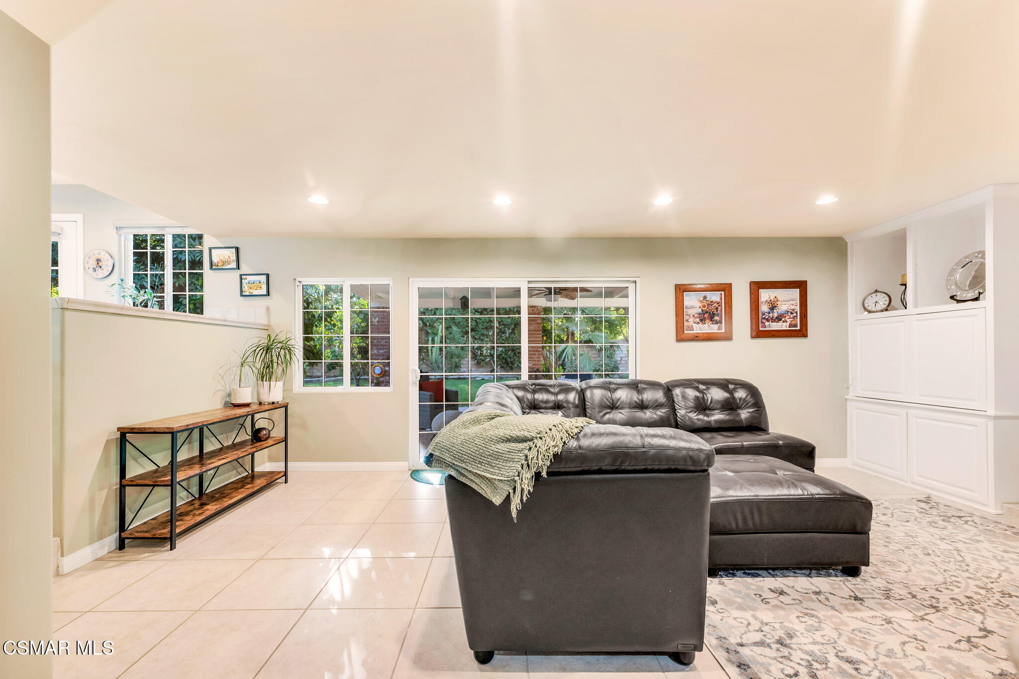 3037 Divernon Avenue Simi Valley, CA 93063 - Photo 18 of 44 a living room with furniture and a large window