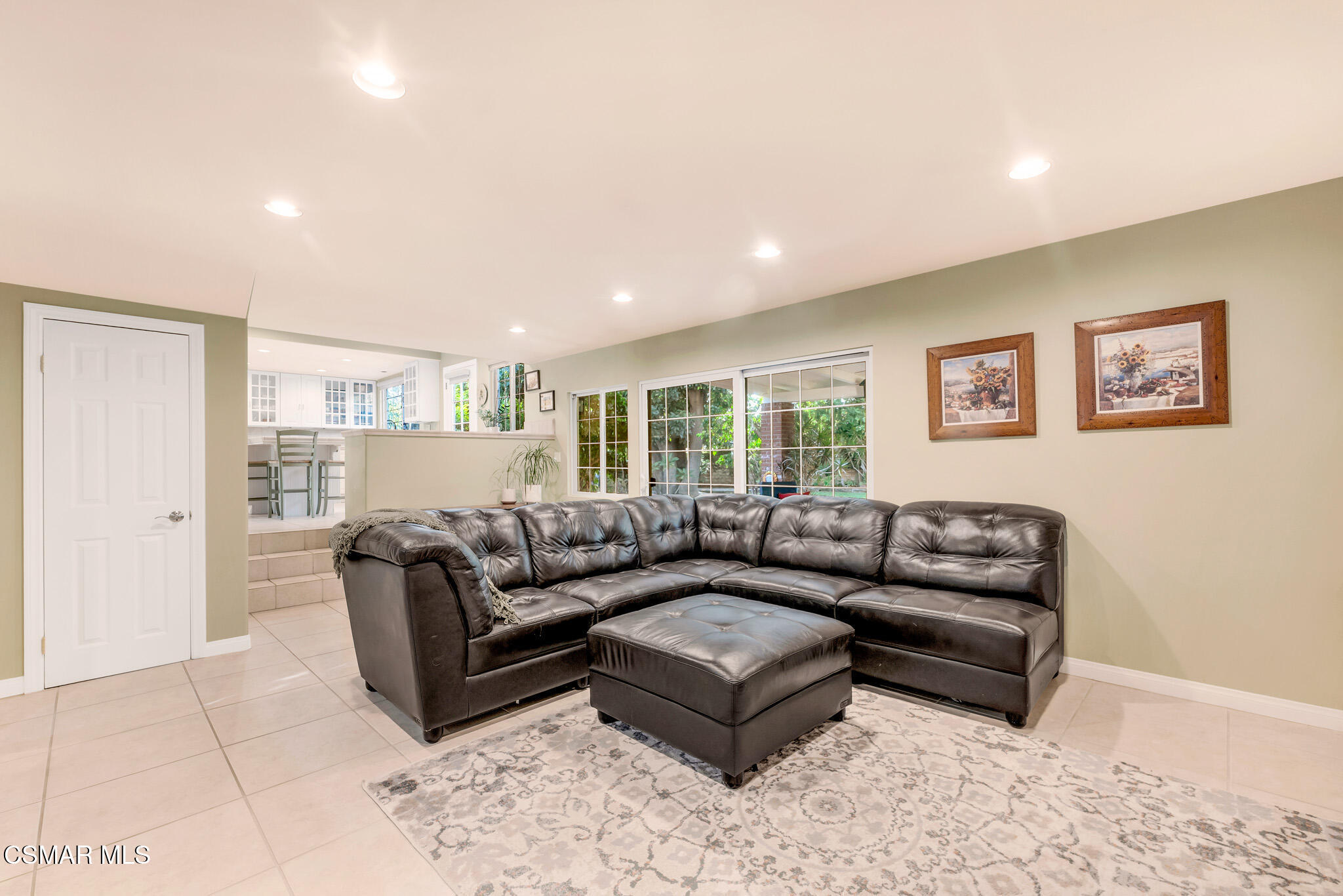 3037 Divernon Avenue Simi Valley, CA 93063 - Photo 19 of 44 a living room with furniture and a large window