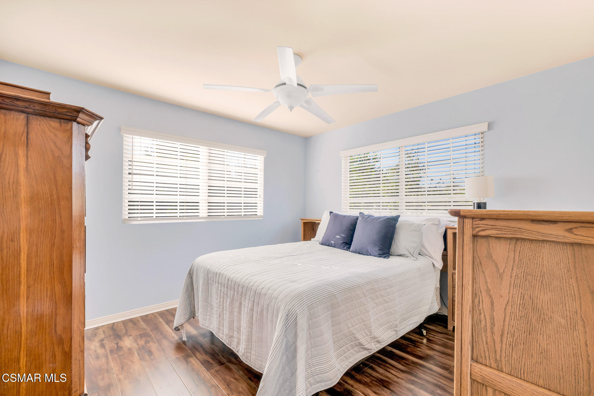 3037 Divernon Avenue Simi Valley, CA 93063 - Photo 24 of 44 a bedroom with a large bed and a window