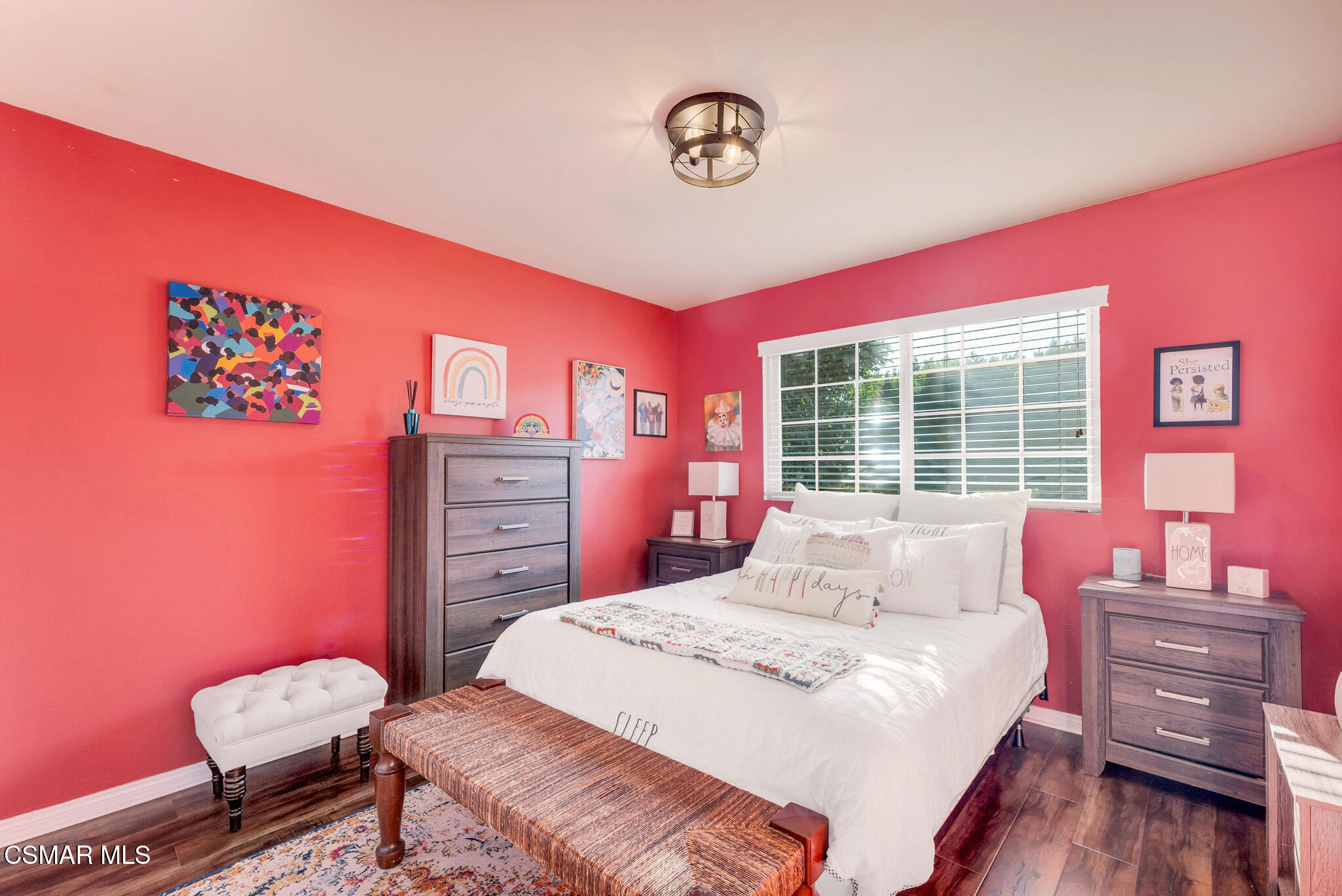 3037 Divernon Avenue Simi Valley, CA 93063 - Photo 28 of 44 a bedroom with a bed and wooden floor